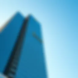 The stunning facade of the Dubai Rolex Tower against a clear blue sky