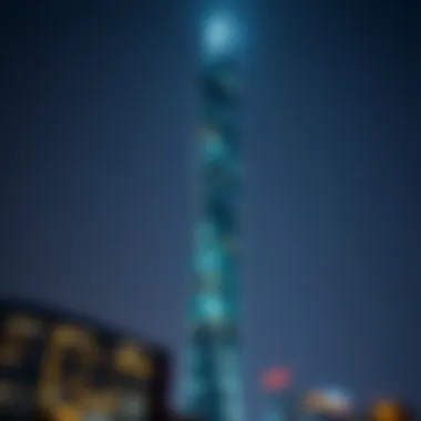 Nighttime view highlighting the Index Tower's illumination.